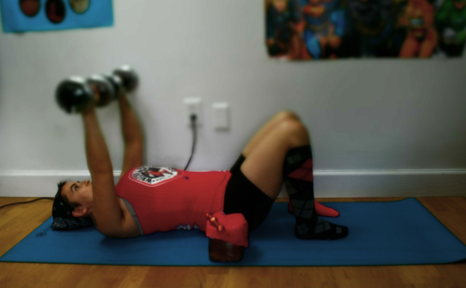 DSC_0127 Chris working out next to their uterus in a Tupperware
